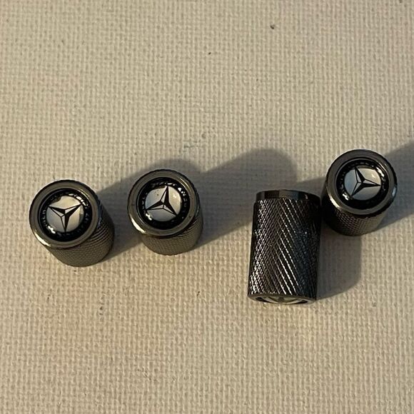 Mercedes Benz logo valve Stem caps in Gray set of 4 NWT - Picture 1 of 4